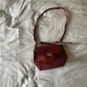 Zara brand. Maroon purse.